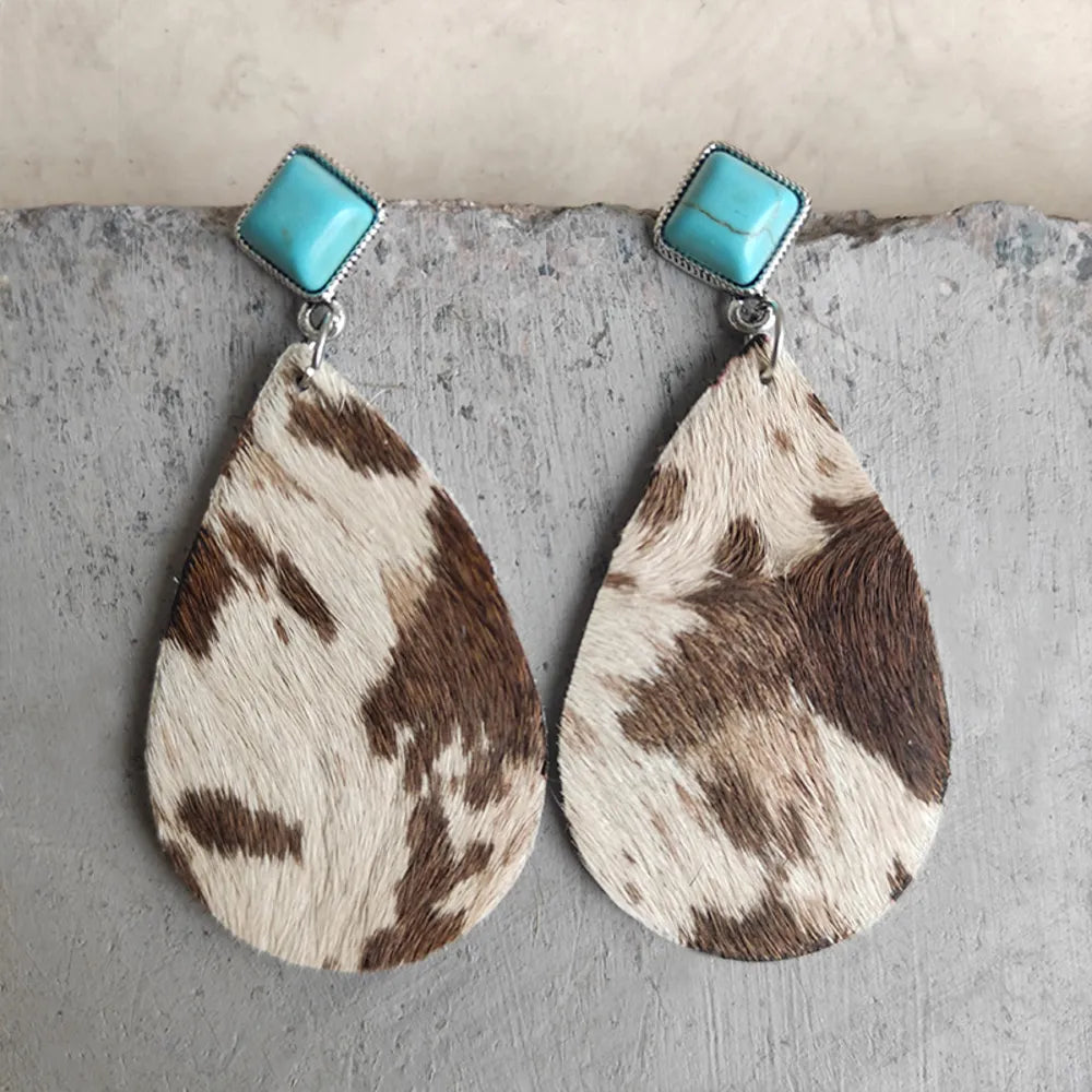 Cow print teardrop earrings with turquoise square tops