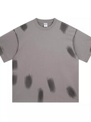 Men's gray t-shirt with abstract brushstroke print and crew neck.