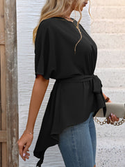 Black asymmetrical hemline tie-waist blouse with short flutter sleeves.