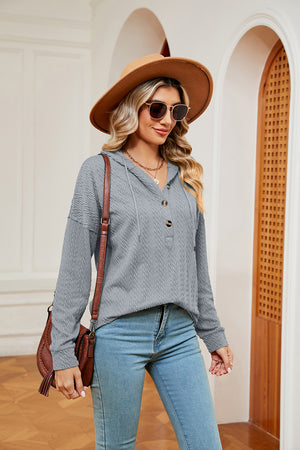 Textured grey henley hoodie with drop shoulder and button neckline