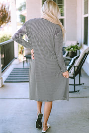 Striped open-front maxi cardigan with long sleeves and a relaxed fit.