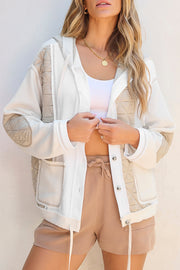 White waffle knit hoodie with quilted panels and adjustable drawstring hem.