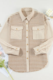 Beige houndstooth corduroy patchwork shacket with two chest pockets and button front.