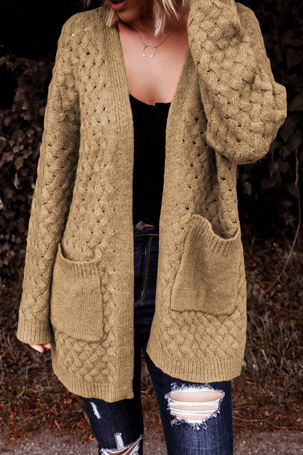 Textured open-knit pocket cardigan in caramel acrylic with a V-neck and long sleeves.