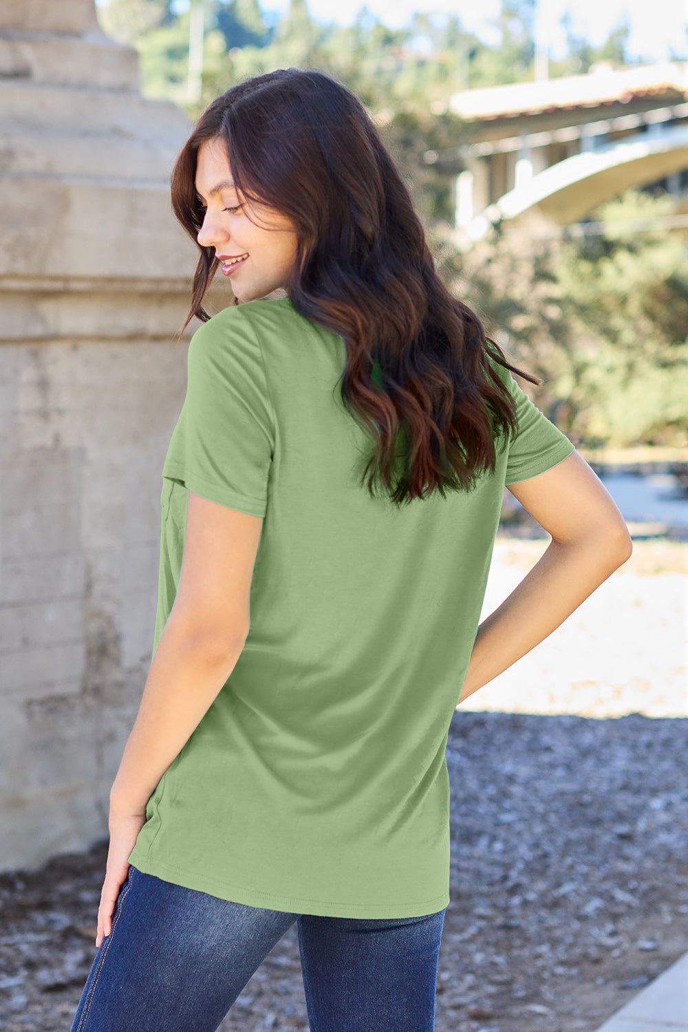 V-neck pocket tee in Matcha Green with short sleeves and a relaxed fit.