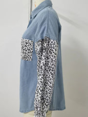 Denim shirt with leopard print sleeves and chest pocket.