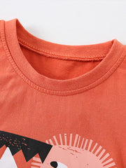 Coral cotton toddler t-shirt with a graphic print and crew neck.