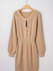 Camel ribbed knit sweater dress with pearl-adorned keyhole neckline and cinched waist.