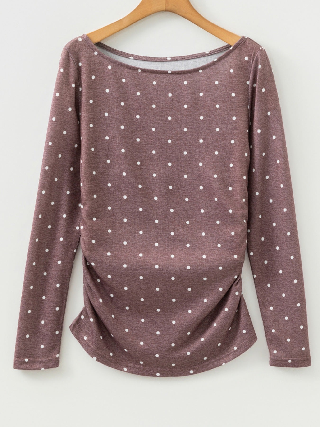 Coffee brown polka dot long-sleeve tee with boat neck and ruched sides.