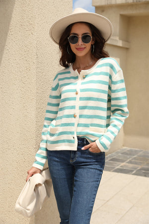 Crewneck cardigan with bold aqua and white stripes, button front, and two pockets.