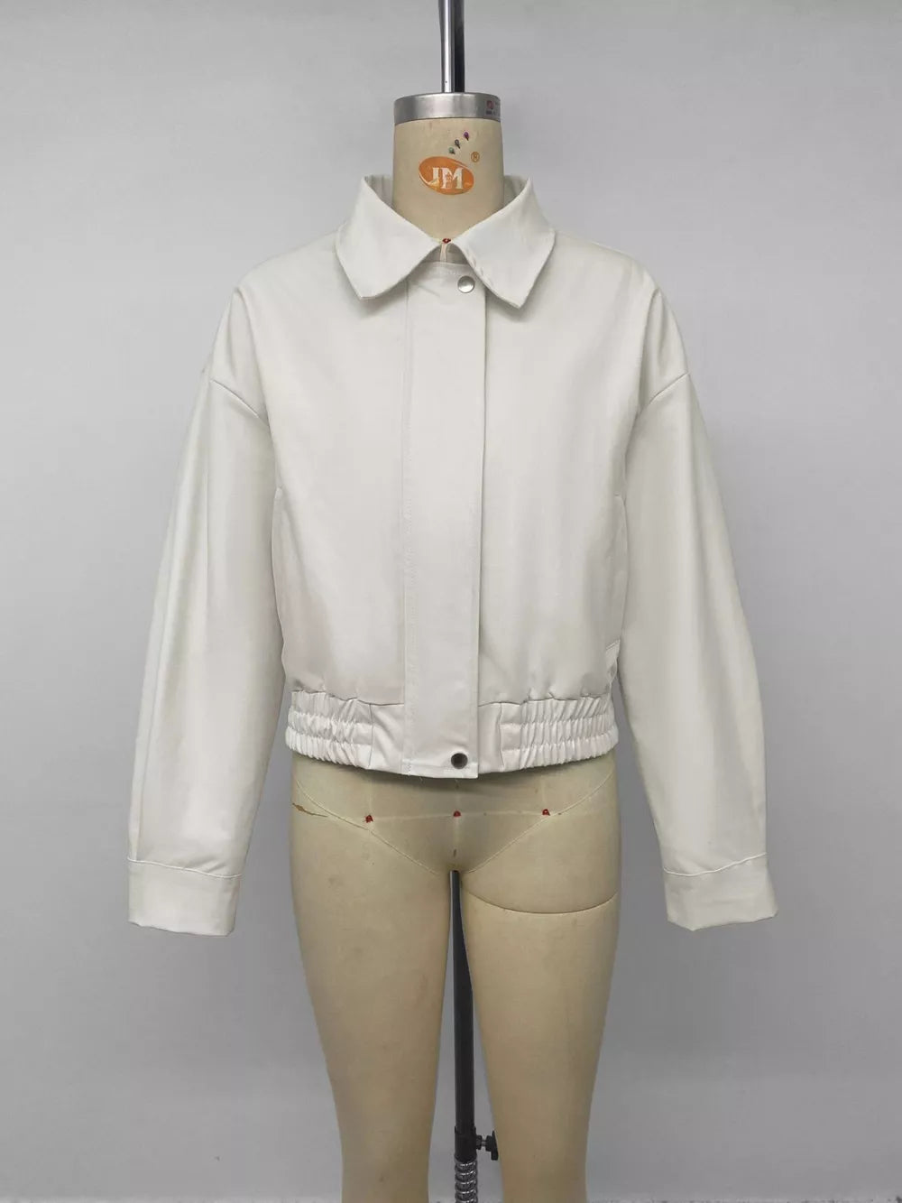 Cropped Faux Leather Jacket in White, fabric detail
