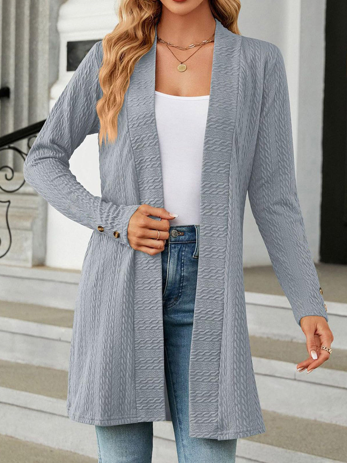 Gray textured knit longline cardigan with button cuffs and open front.