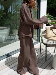 Brown relaxed fit button-up shirt and wide-leg pants outfit set.