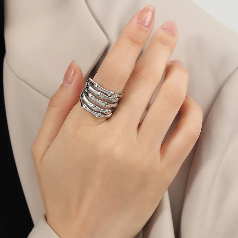 Silver titanium ring with bamboo-inspired segmented design