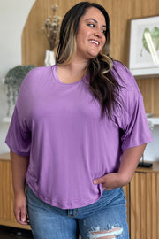 Lavender boxy dolman crop t-shirt with relaxed fit and short sleeves.