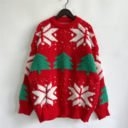 Red acrylic knit sweater with green Christmas trees and white snowflakes.
