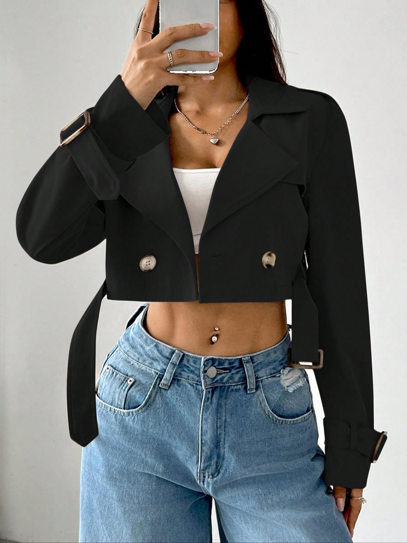 Black cropped double-breasted trench coat with belted waist and adjustable cuffs.