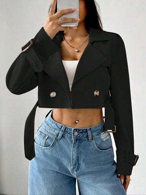 Black cropped double-breasted trench coat with belted waist and adjustable cuffs.