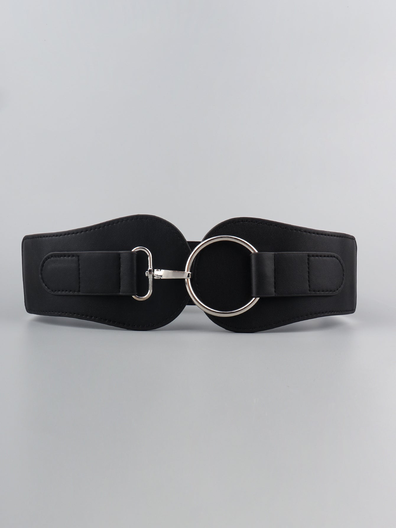 Black cincher belt with sculpted silver buckle and ring detail