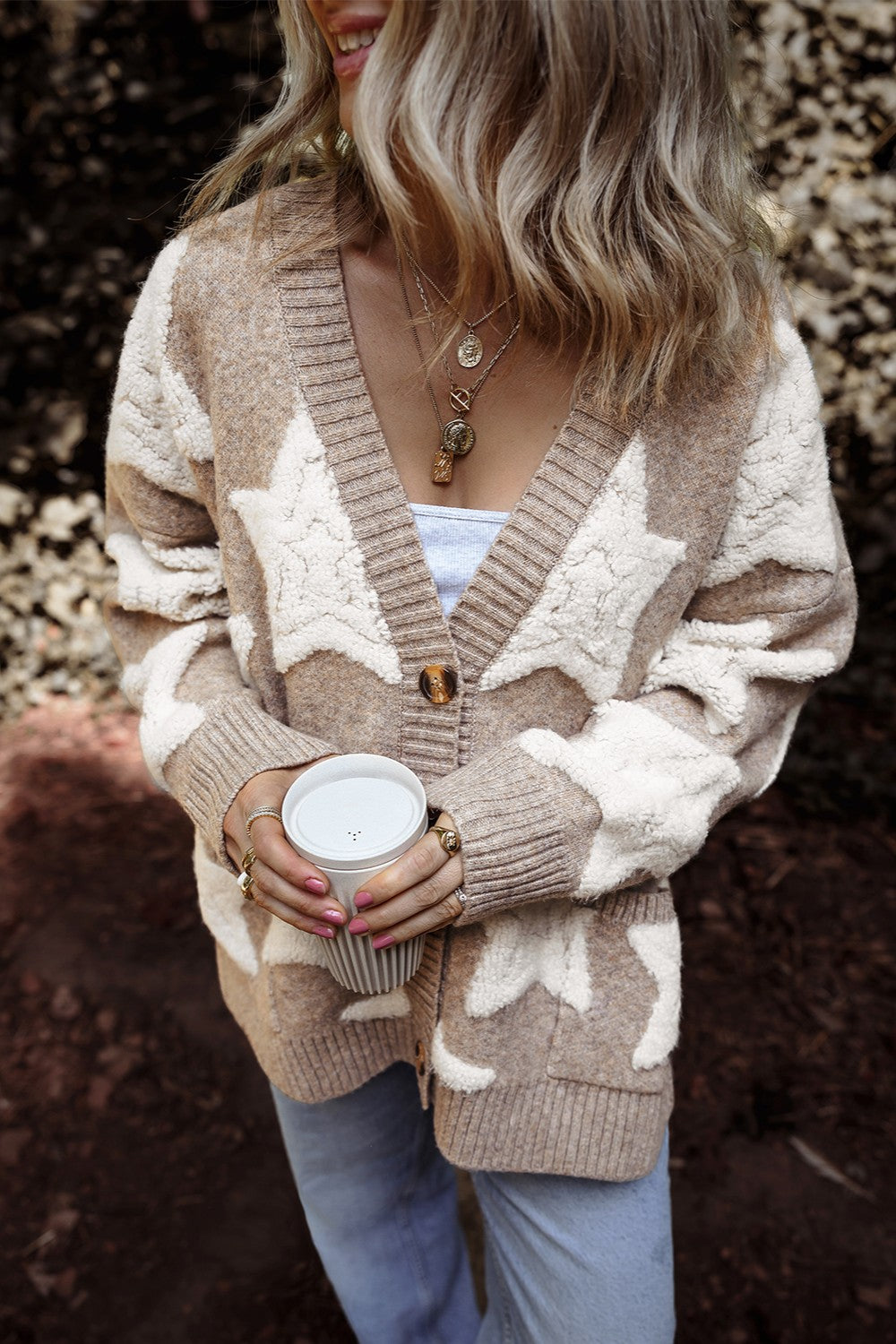 Textured starburst knit cardigan in mocha with button front and V-neck.