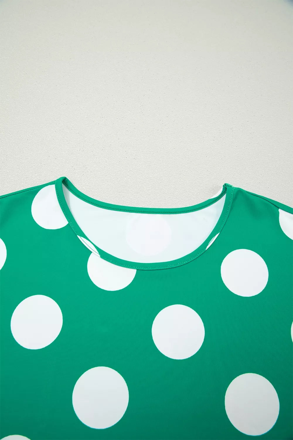 Green polka dot cropped tee with crew neck