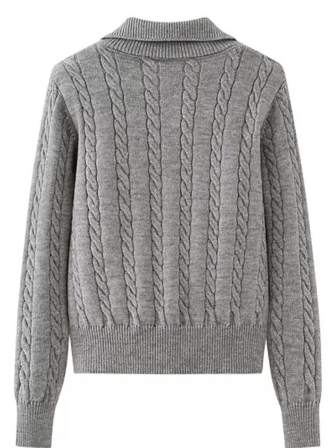 Cable knit quarter-zip pullover sweater in dark gray with ribbed collar and cuffs.