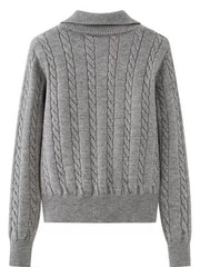 Cable knit quarter-zip pullover sweater in dark gray with ribbed collar and cuffs.