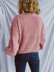 Textured ribbed knit relaxed crewneck pullover in dusty pink, shown from the back.