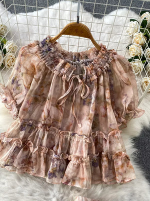 Floral ruffle set with bow detail in pink and brown tie-dye.