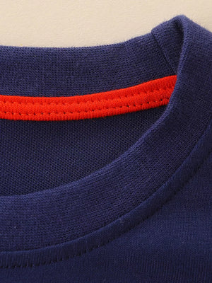 Navy cotton crew neck toddler t-shirt with red trim detail.