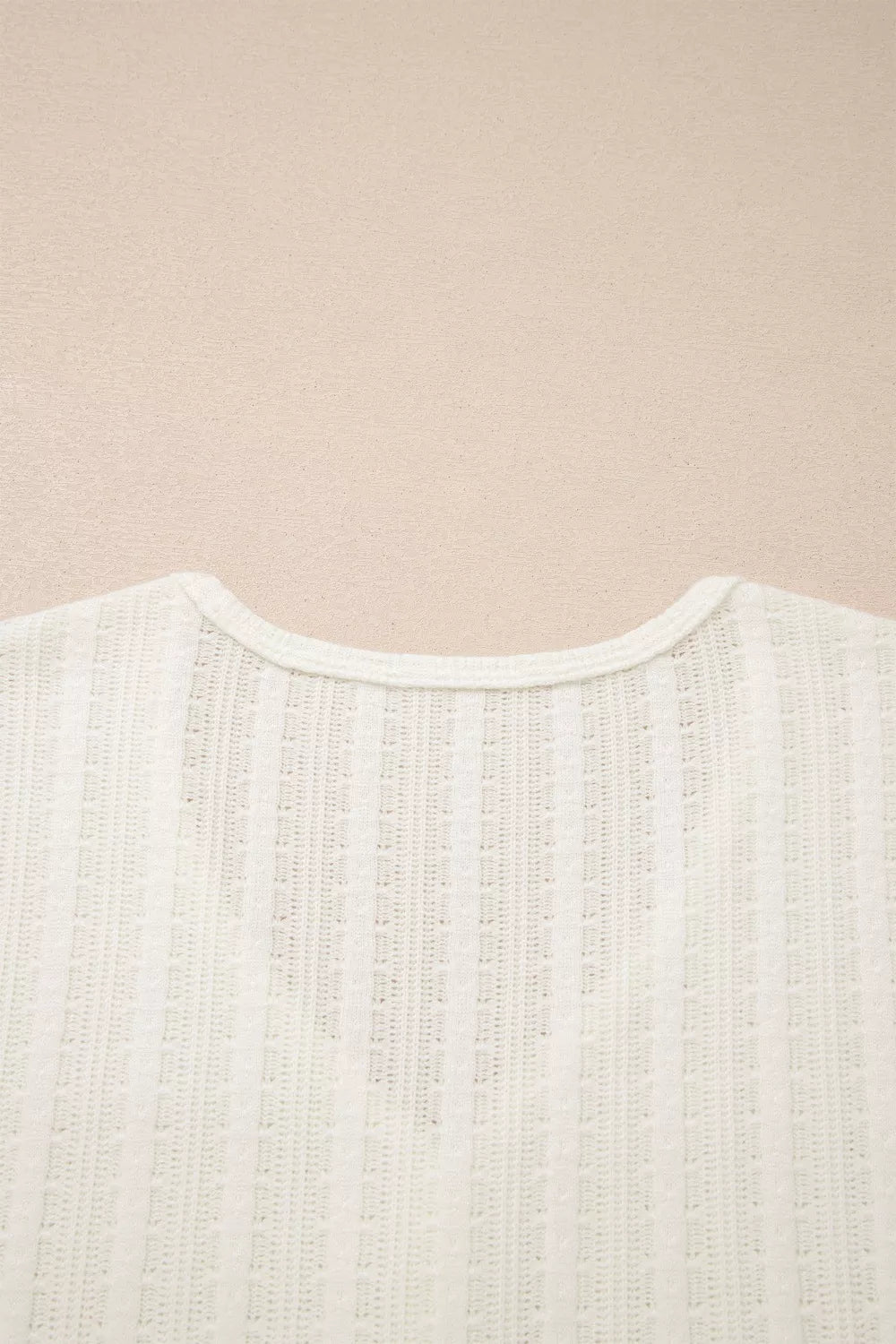 Textured white maternity t-shirt with V-neck and button details