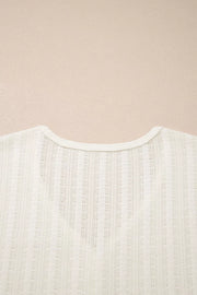 Textured white maternity t-shirt with V-neck and button details