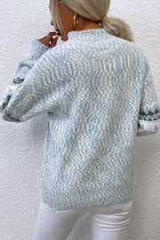 Nordic Fair Isle mock neck knit sweater in Cloudy Blue acrylic with a diamond pattern.