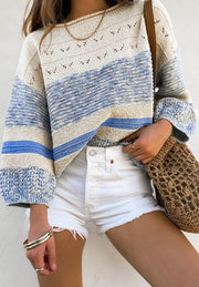 Striped knit sweater with eyelet yoke in light blue and cream, featuring a relaxed fit and 3/4 sleeves.