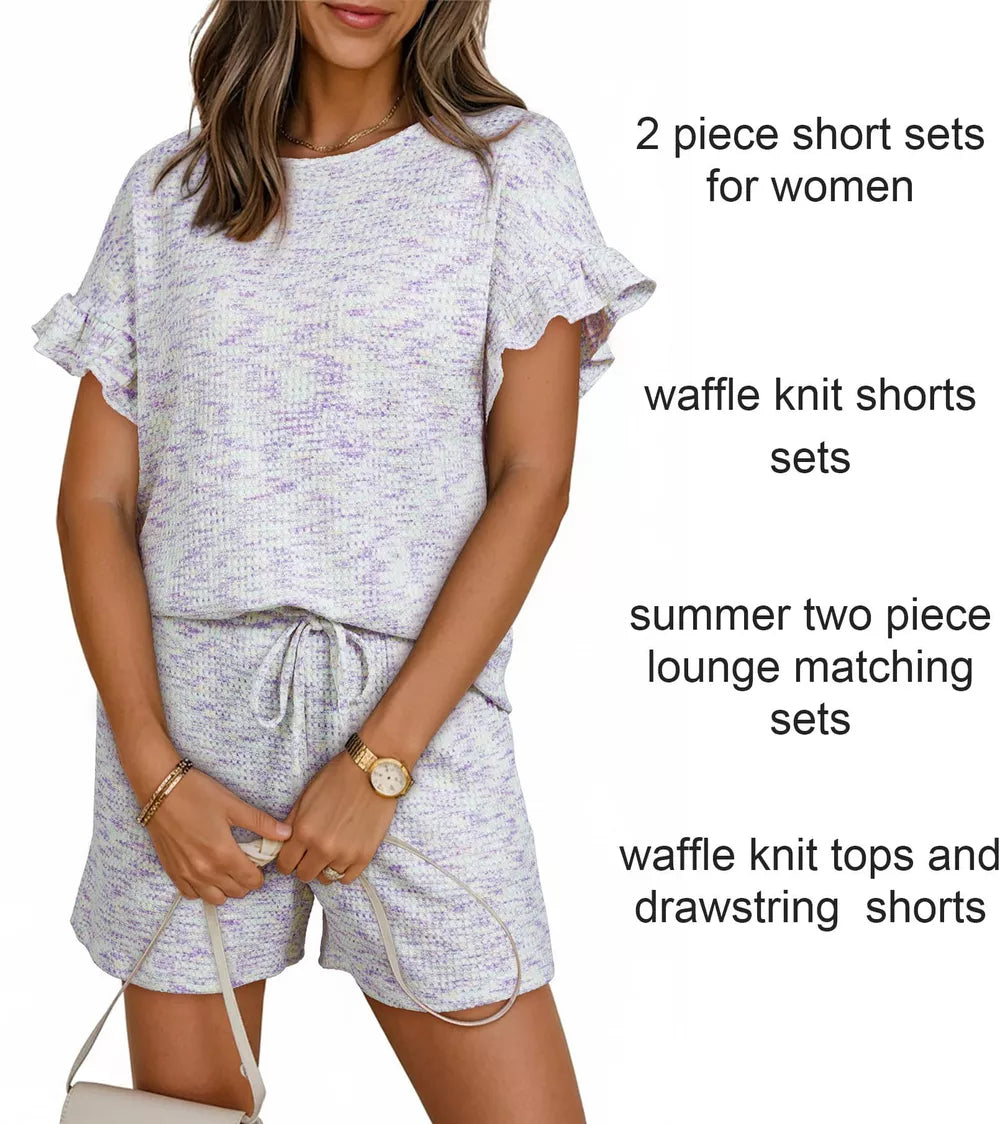 Ruffled sleeve two-piece set in white with purple flecks, waffle knit top and drawstring shorts.