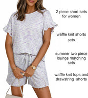 Ruffled sleeve two-piece set in white with purple flecks, waffle knit top and drawstring shorts.