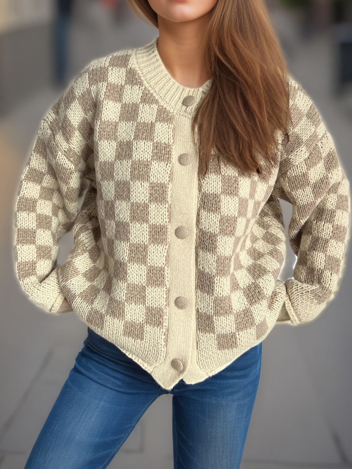 Checkerboard knit button-up cardigan in taupe and cream acrylic with button closure.