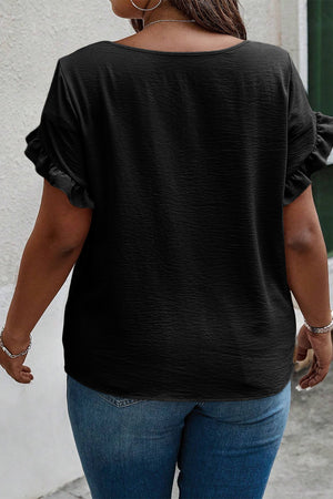 Black polyester blouse with textured fabric and ruffled short sleeves.
