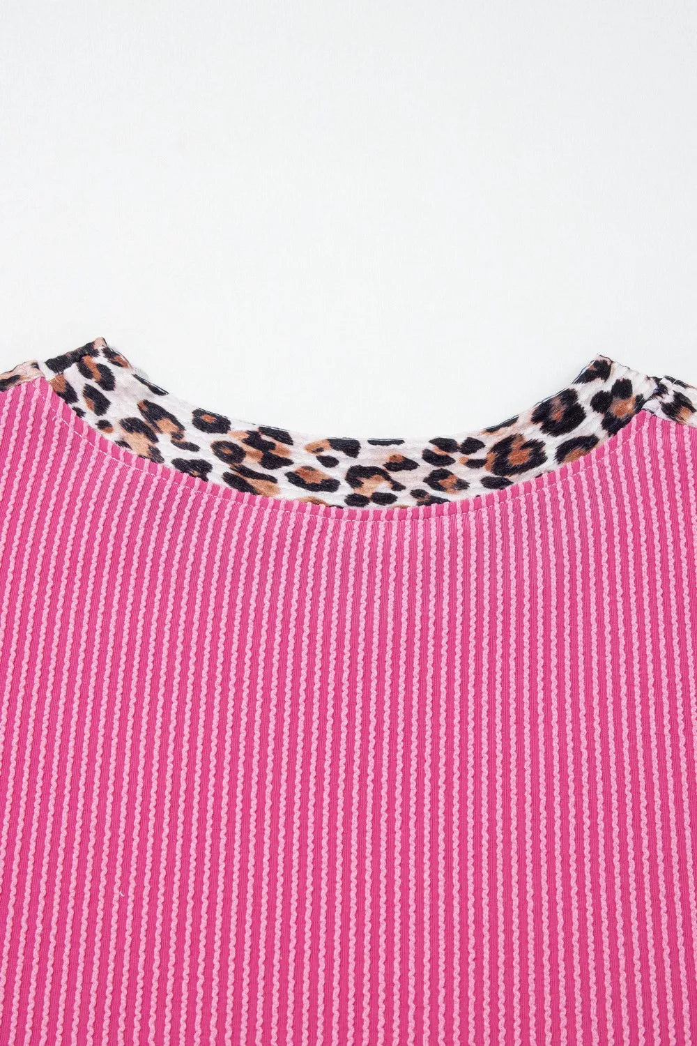 Pink ribbed crew neck top with leopard print trim