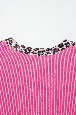 Pink ribbed crew neck top with leopard print trim