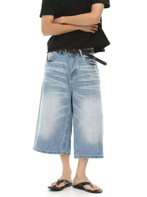 Light blue relaxed fit cropped jeans for men in cotton with a faded wash.