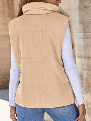 Ribbed corduroy zip-up vest coat in apricot with a high collar and quilted detail.