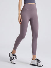 Lilac high-waist contour leggings with a seamless design and athletic fit.