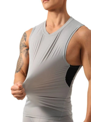 Gray performance tank top with black side panels and a crew neck.