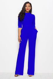 Royal blue high-neck belted palazzo jumpsuit with 3/4 sleeves.