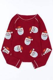 Scarlet waffle knit top with sequin Santa faces, crew neck, long sleeves.