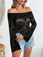 Black velvet floral off-shoulder blouse with bell sleeves and sheer fabric.