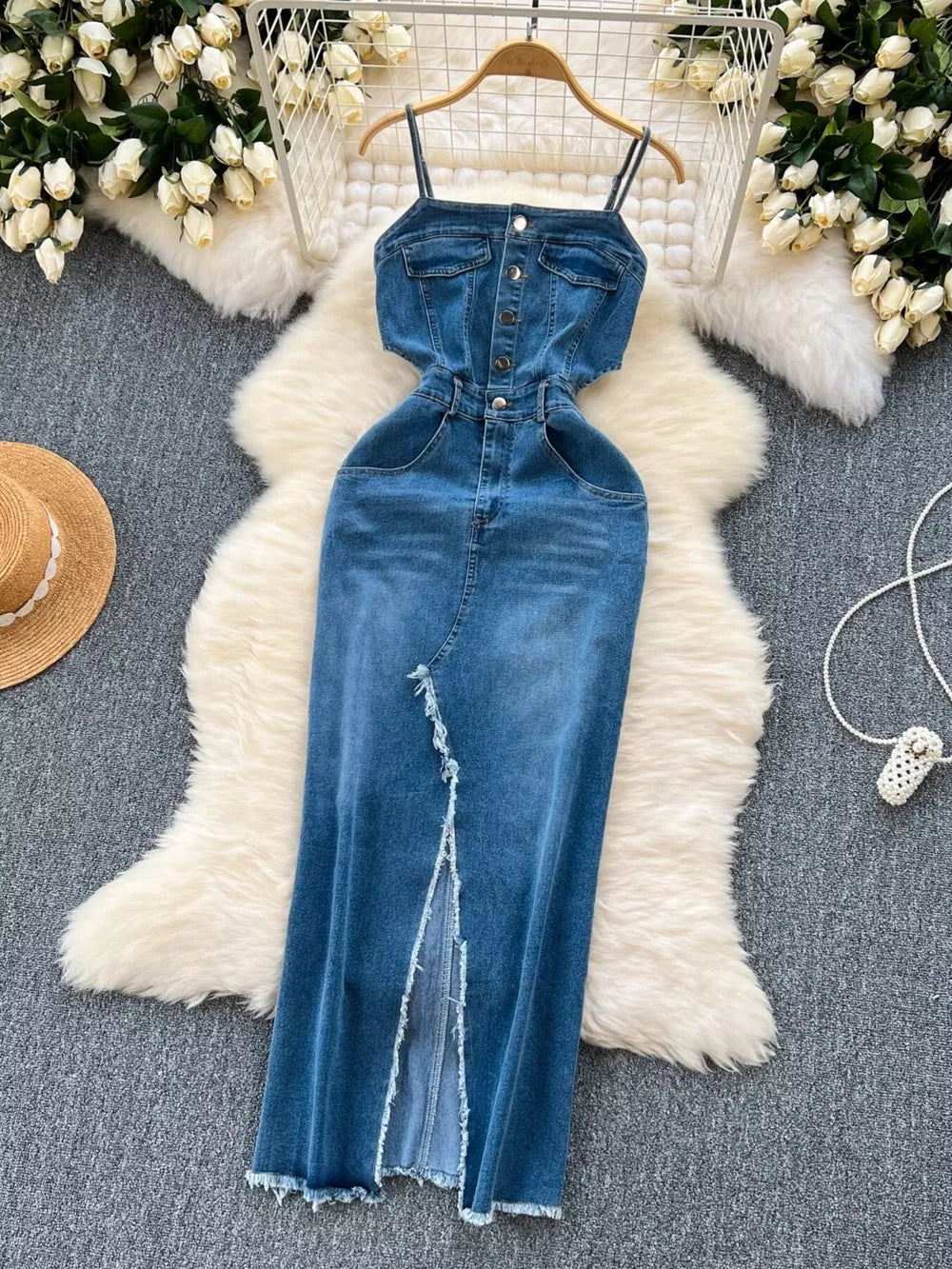 Cutout denim maxi dress with button front, chest pockets, and frayed hem slit