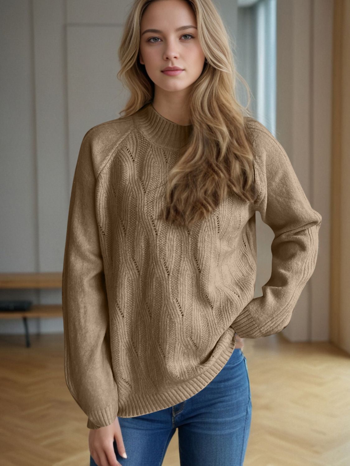 Camel textured knit raglan sleeve pullover sweater with diamond pattern detail.