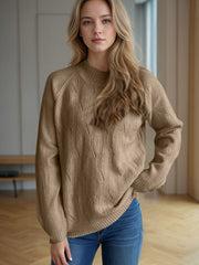 Camel textured knit raglan sleeve pullover sweater with diamond pattern detail.